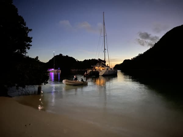 Richard and Carolyn Powles family's SV Moon River at shore.