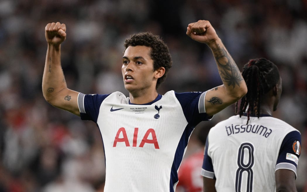 Tottenham Hotspur's Welsh forward #22 Brennan Johnson celebrates scoring the opening goal during the UEFA Europa League final football match between Tottenham Hotspur and Manchester United at San Mames stadium in Bilbao on May 21, 2025. (Photo by Josep LAGO / AFP)