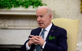 US President Joe Biden speaks during a virtual meeting with Irish Prime Minister (Taoiseach) Micheal Martin in the Oval Office of the White House on March 17, 2021 in Washington, DC.