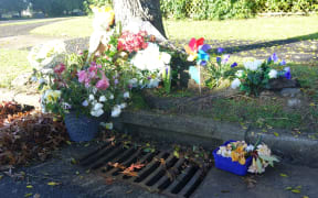 Tributes have been left at the drain Violet Tupou died in.