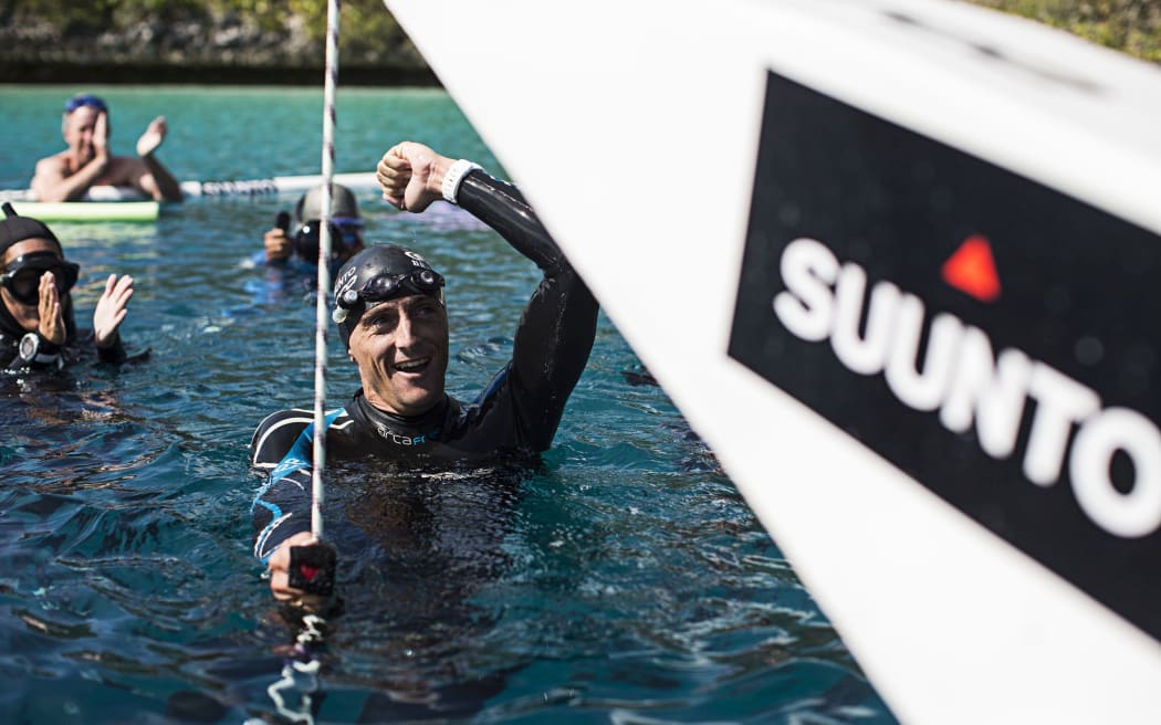 William Trubridge celebrates a successful dive in The Bahamas.