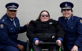 Superintendent Warwick Morehu (R), Natalya and Assistant Commissioner Tusha Penny