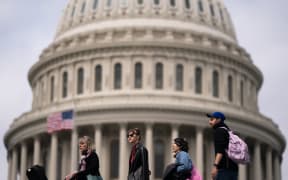 Visitors walk past the US Capitol on 20 April, 2024 in Washington, DC.