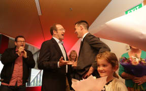 New Wellington mayor Justin Lester, who ran on a Labour Party ticket, is greeted at his victory party by Labour leader Andrew Little.