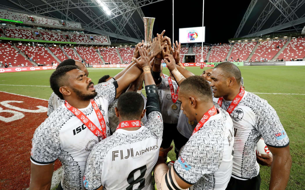 Fiji celebrate beating Australia in the Singapore Sevens final.