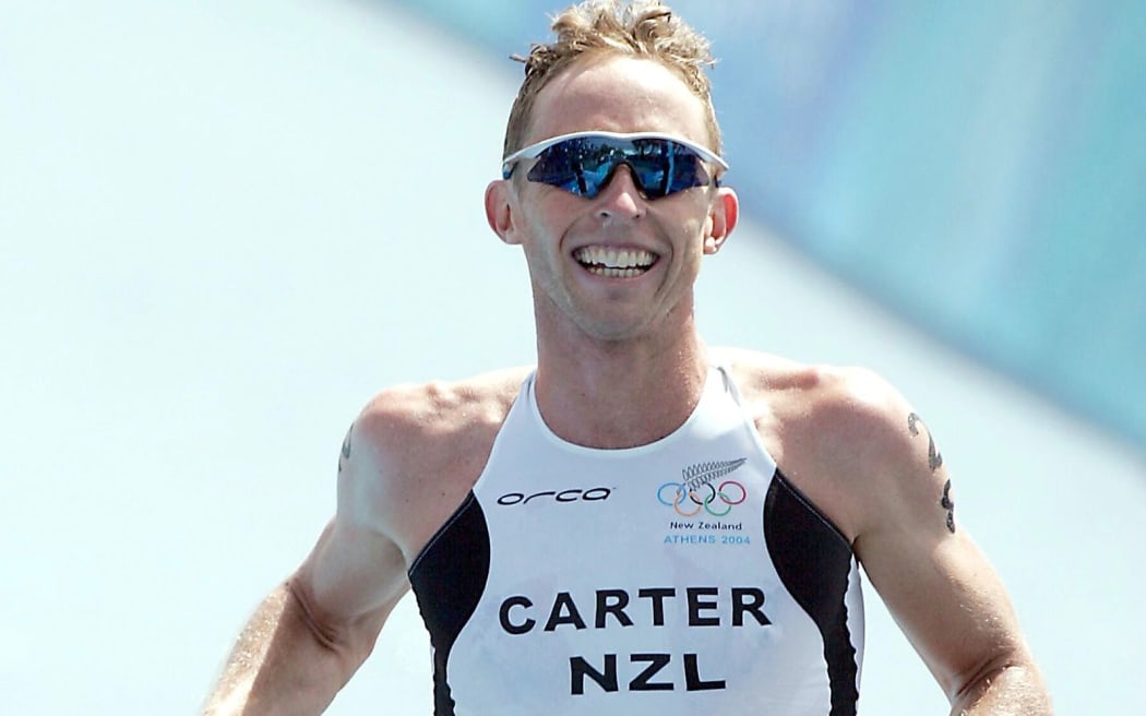 Hamish Carter wins the Olympic triathlon in Athens in 2004.