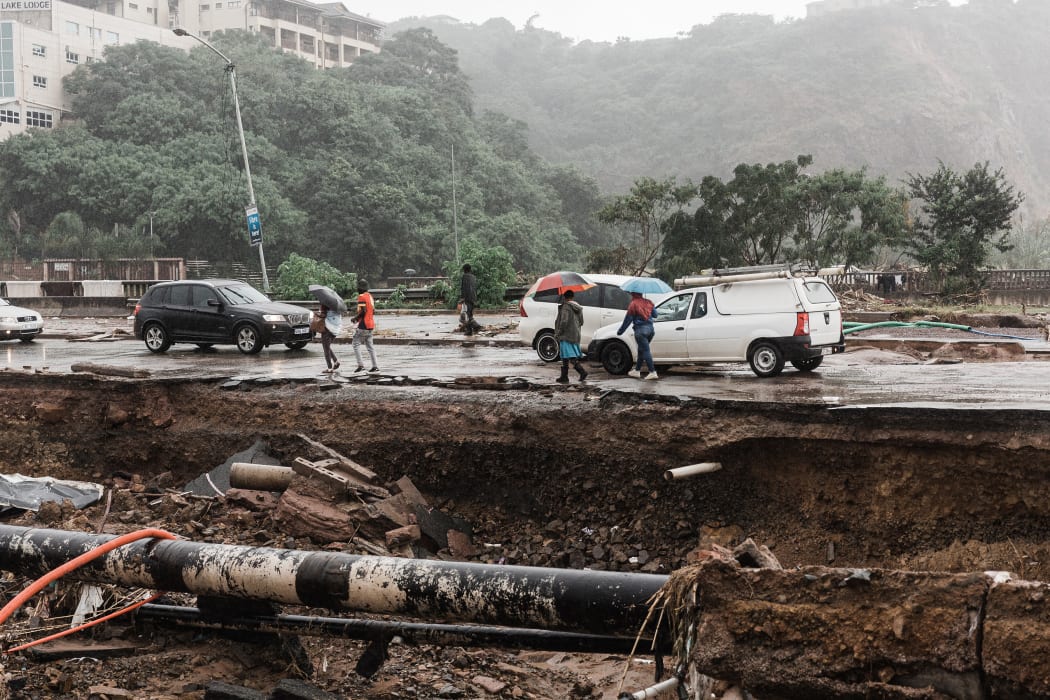 South Africa deployed 10,000 troops on to help restore power and water and search for 63 people who remain missing after deadly storms battered its east coast.