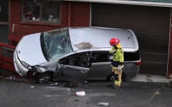 Emergency services are at the scene of what appears to be a car v house on Vipond Road in Auckland’s Stanmore Bay on 19 June 2026.