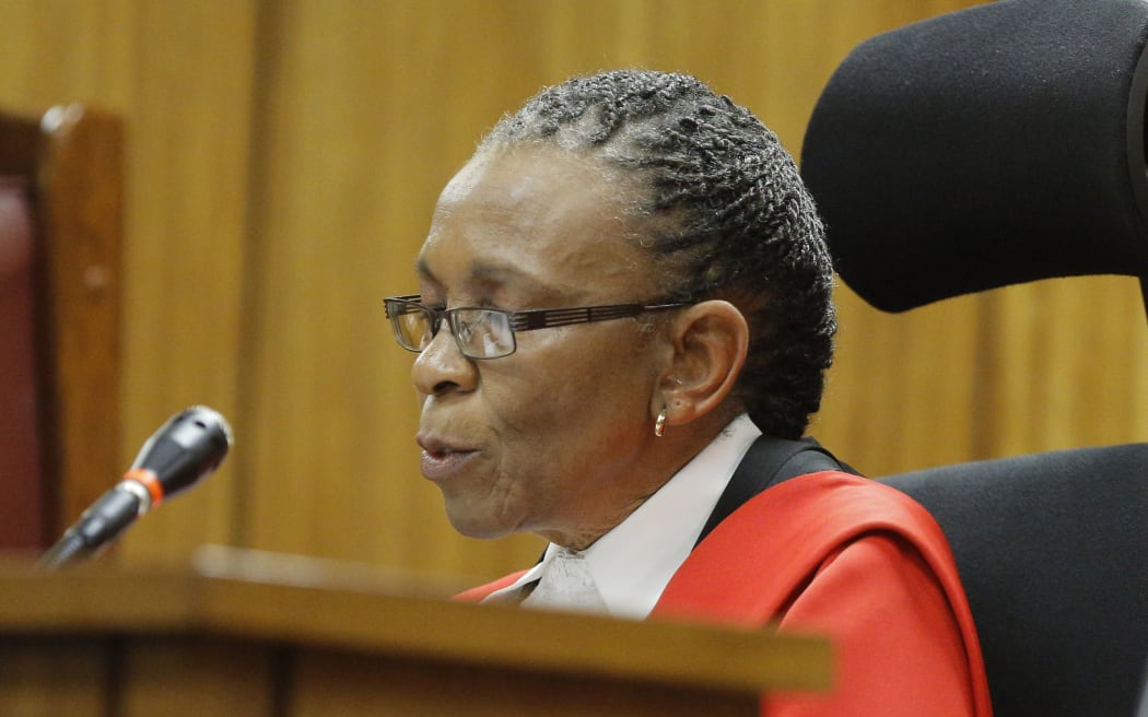 Judge Thokozile Masipa reads her verdict.