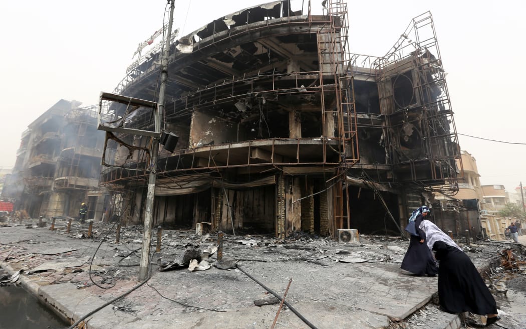 A damaged building in Baghdad at the site of a bomb attack claimed by Islamic State.