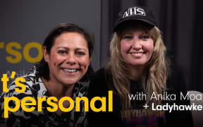 Ladyhawke joins Anika Moa in studio for season two of It's Personal. The words "It's Personal" appear in yellow and bold, with the words "with Anika Moa + J Ladyhawke" in white.
