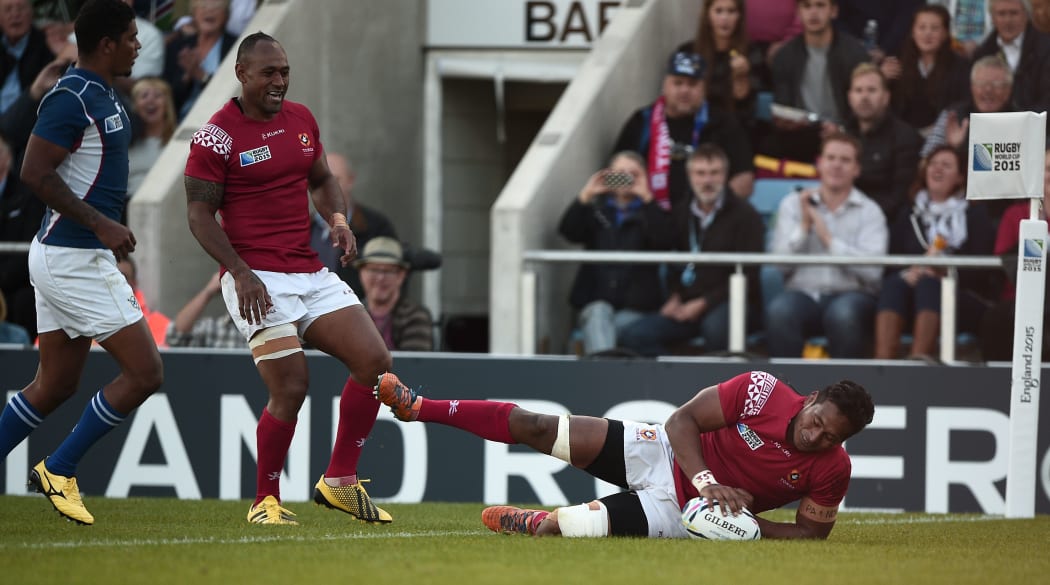 Jack Ram scores one of his two tries in Tonga's Rugby World Cup win over Namibia.