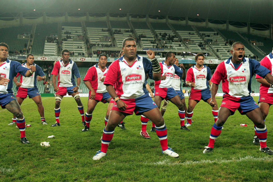 Pacific Islanders perform haka during the match between NSW Waratahs v Punjas Pacific Islands, Aussie Stadium. 25th June 2004. Photograph taken by Paul Seiser ©Seiser Photography/ Photosport