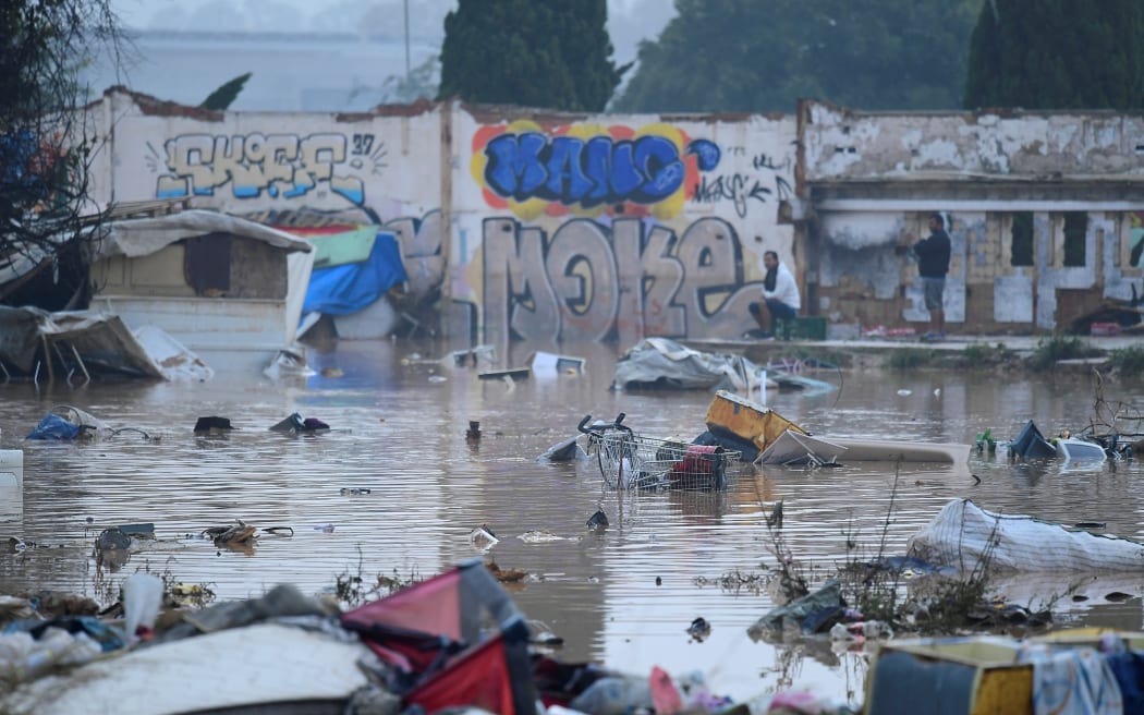 A flooded slum area is pictured in Picuana, near Valencia, eastern Spain, on October 30, 2024. - Floods triggered by torrential rains in Spain's eastern Valencia region has left 51 people dead, rescue services said on October 30. (Photo by Jose Jordan / AFP)
