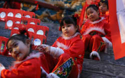 Children perform at the lantern festival, marking the last day of the Chinese new year, at Chinatown in Yokohama, Japan in  February 2019.