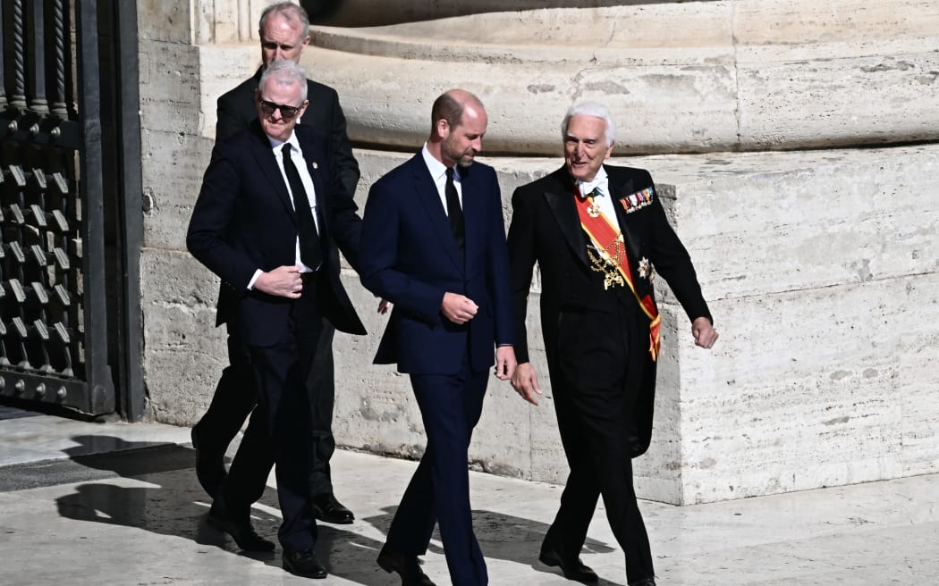 Britain's Prince William (C) arrives ahead of the late Pope Francis' funeral ceremony at St Peter's Square at The Vatican on April 26, 2025. (Photo by Filippo MONTEFORTE / AFP)
