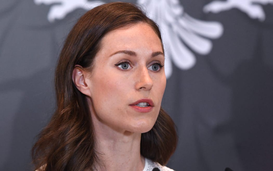 Finland's Prime Minister Sanna Marin speaks during a press point after meeting with  Albania's prime minister   in Tirana, on June 21, 2022. - The Finnish Prime Minister is on a Western Balkans tour. (Photo by Gent SHKULLAKU / AFP)