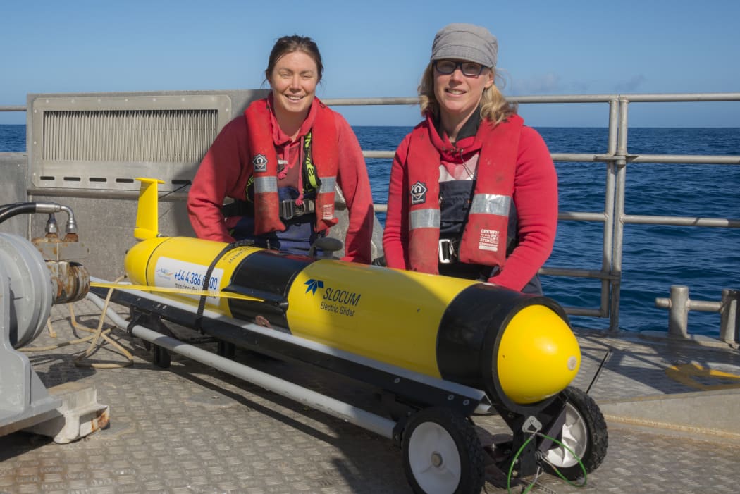 Fiona Elliott and Joe O'Callaghan with NIWA's Slocum Glider after a successful deployment and recovery operation off the Kapiti coast.