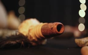 10062016 Photo: RNZ/Rebekah Parsons-King. Musician Alistair Fraser perfoms in studio using a variety of instruments. Pictured is a Putatara.