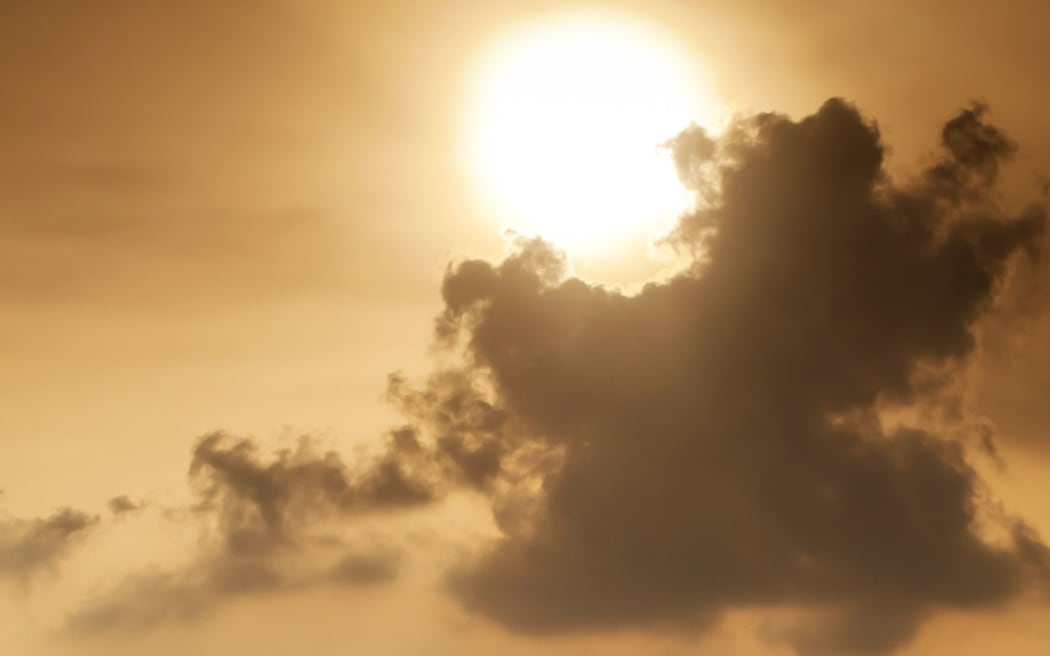 A file photo shows smog above a town.