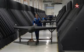 Footage on Russian state TV from the military channel Zvezda shows deadly attack drones being assembled in what it calls the biggest drone factory in the world.