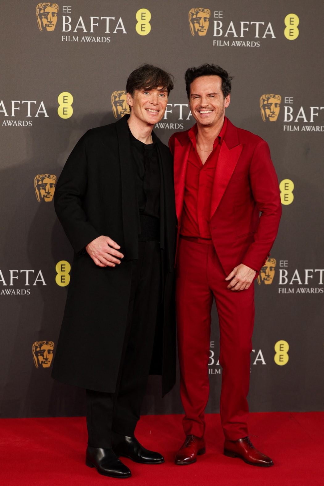 Irish actor Cillian Murphy (L) and Irish actor Andrew Scott (R) pose on the red carpet upon arrival at the BAFTA British Academy Film Awards at the Royal Festival Hall, Southbank Centre, in London, on February 18, 2024. (Photo by Adrian DENNIS / AFP)