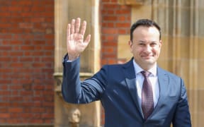 (FILES) Ireland's Prime Minister Leo Varadkar waves as he arrives for the final day of a conference to mark the 25th anniversary of the Good Friday Agreement, at Queen's University in Belfast on April 19, 2023. Leo Varadkar announced on March 20, 2024 that he was stepping down as Ireland's prime minister and leader of the Fine Gael party in the governing coalition for personal and political reasons. "I am resigning the presidency and leadership of Fine Gael and will resign as Taoiseach as soon as my successor is able to take up that office," an emotional Varadkar told reporters in Dublin. (Photo by PAUL FAITH / AFP)