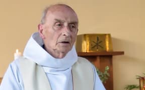 Father Jacques Hamel celebrating a mass in the church of Saint-Etienne-du-Rouvray in June.