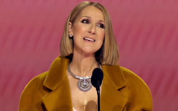 LOS ANGELES, CALIFORNIA - FEBRUARY 04: Celine Dion speaks onstage during the 66th GRAMMY Awards at Crypto.com Arena on February 04, 2024 in Los Angeles, California.   Kevin Winter/Getty Images for The Recording Academy/AFP (Photo by KEVIN WINTER / GETTY IMAGES NORTH AMERICA / Getty Images via AFP)