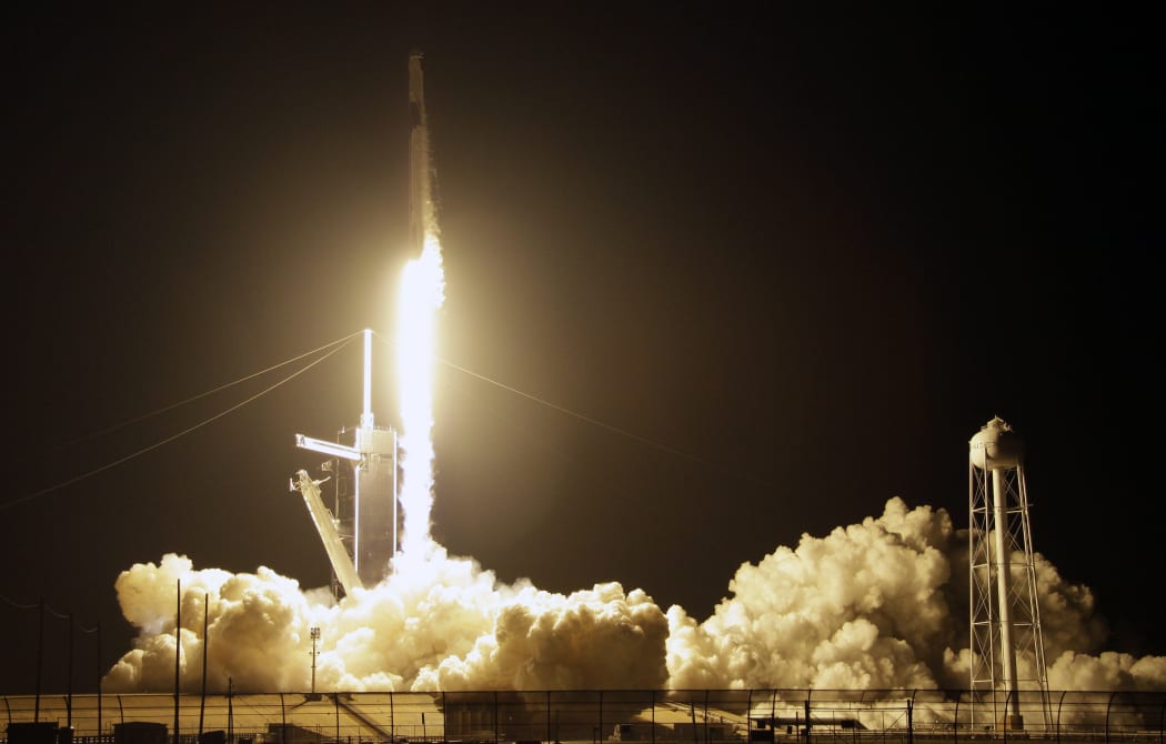 A SpaceX Falcon 9 rocket with a demo Crew Dragon spacecraft lifts off from pad 39A at the Kennedy Space Center in Cape Canaveral, Fla., Saturday, March 2, 2019.
