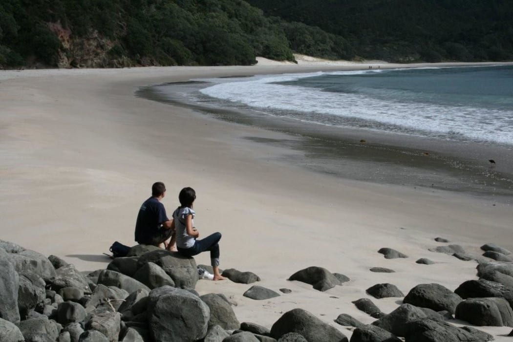 Visitors to New Chums beach in April 2010.