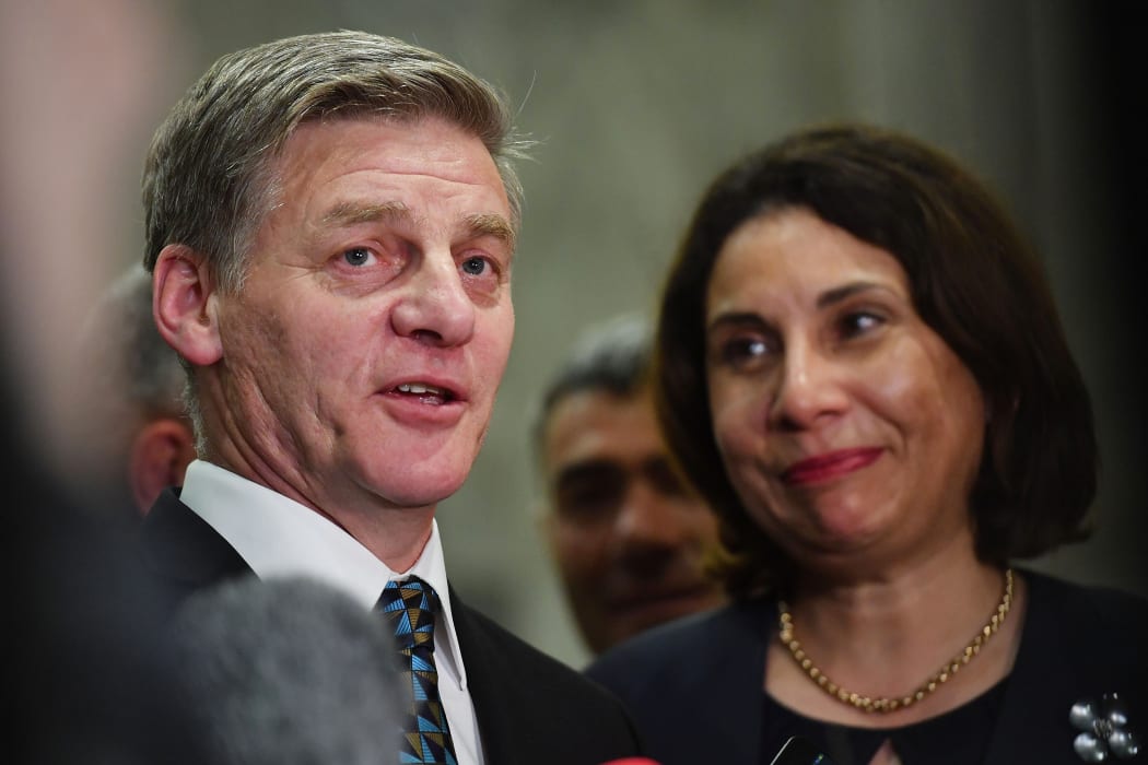 Departing National Party leader Bill English, with wife Mary, speaking after NZ First chose Labour as a coalition partner.