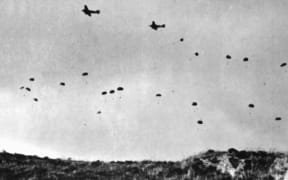 German paratroopers jumping from Ju 52s over Crete, May 1941.
