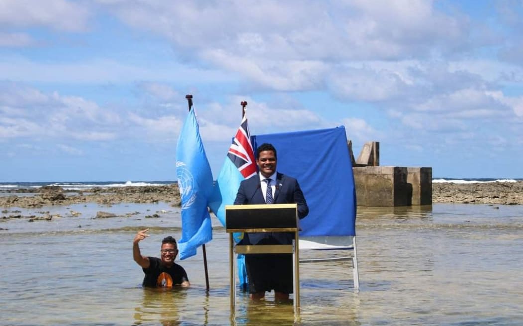 Tuvalu's foreign minister did his COP26 statement like no other by speaking behind a podium at sea, standing in knee-deep water. He made his speech  at sea to address rising sea levels affecting Pacific nations, such as Tuvalu. The recording was shot by public broadcaster TVBC.