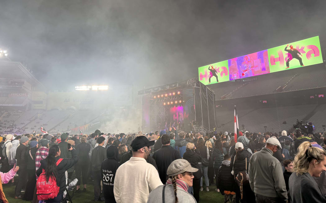 People pack the pitch to watch Six60 perform ahead of the haka.