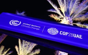 COP28 logo on the opening day of the United Nations Climate Change Conference COP28 in Dubai, United Arab Emirates on November 30, 2023. (Photo by Jakub Porzycki/NurPhoto) (Photo by Jakub Porzycki / NurPhoto / NurPhoto via AFP)