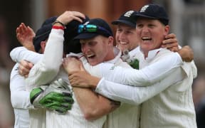 The England all-rounder Ben Stokes (centre) celebrates their test win over New Zealand at Lord's with his team-mates.