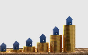 Generic graphic showing rising house, unit, apartment rises.