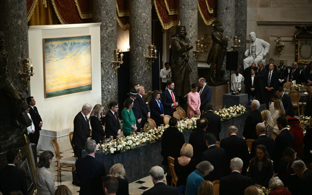 US President Donald Trump attends a luncheon following the inauguration ceremony, in Statuary Hall at the US Capitol in Washington, DC, on January 20, 2025. (Photo by Brendan SMIALOWSKI / AFP)