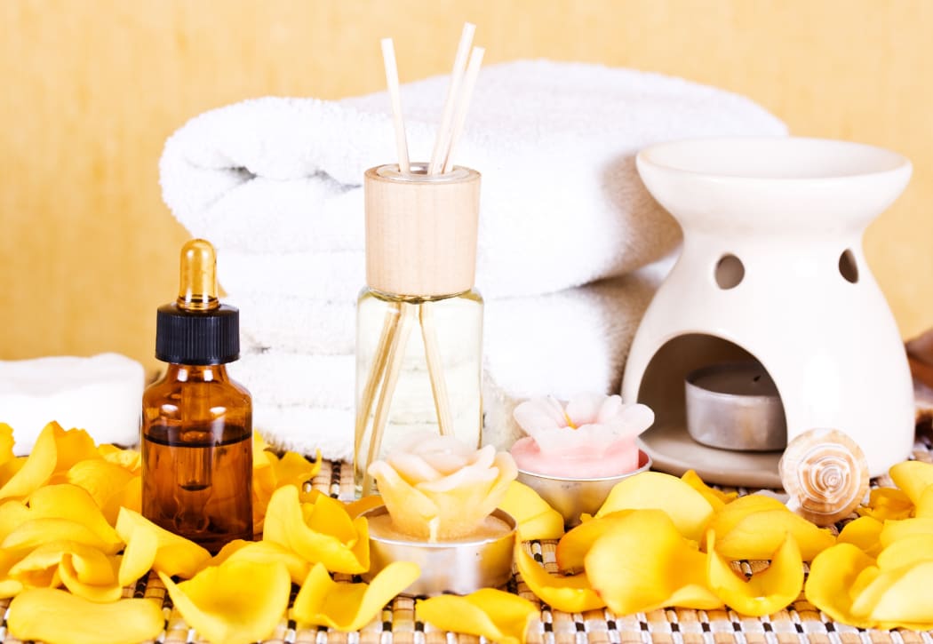 20688449 - spa facilities, aroma oils, candles and petals of roses