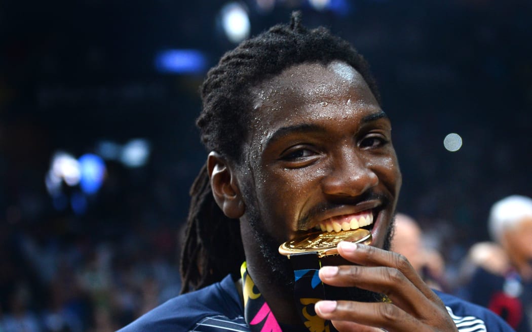 Kenneth Faried celebrates after the United States' World Cup win.
