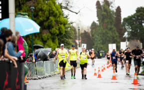 Achilles International New Zealand helps empower runners with disabilities.