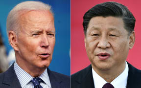 This combination of file pictures created on June 08, 2021, shows US President Joe Biden (L) speaking at the Eisenhower Executive Office Building in Washington, DC on June 2, 2021; and Chinese President Xi Jinping speaking on arrival at Macau's international airport on December 18, 2019.