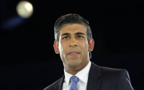 Rishi Sunak, Britain's former Chancellor of the Exchequer and a contender to become the country's next Prime Minister and leader of the Conservative party, answers questions as he takes part in the final Conservative Party Hustings event at Wembley Arena, in London, on August 31, 2022.
