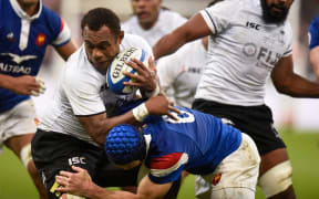 Fiji lock Leone Nakarawa takes the ball into contact.