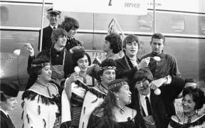 The Beatles and members of the Te Pataka concert party at Wellington Airport, 21 June 1964.
