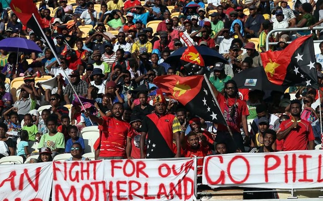 Papua New Guinea fans show their support at the Nations Cup.