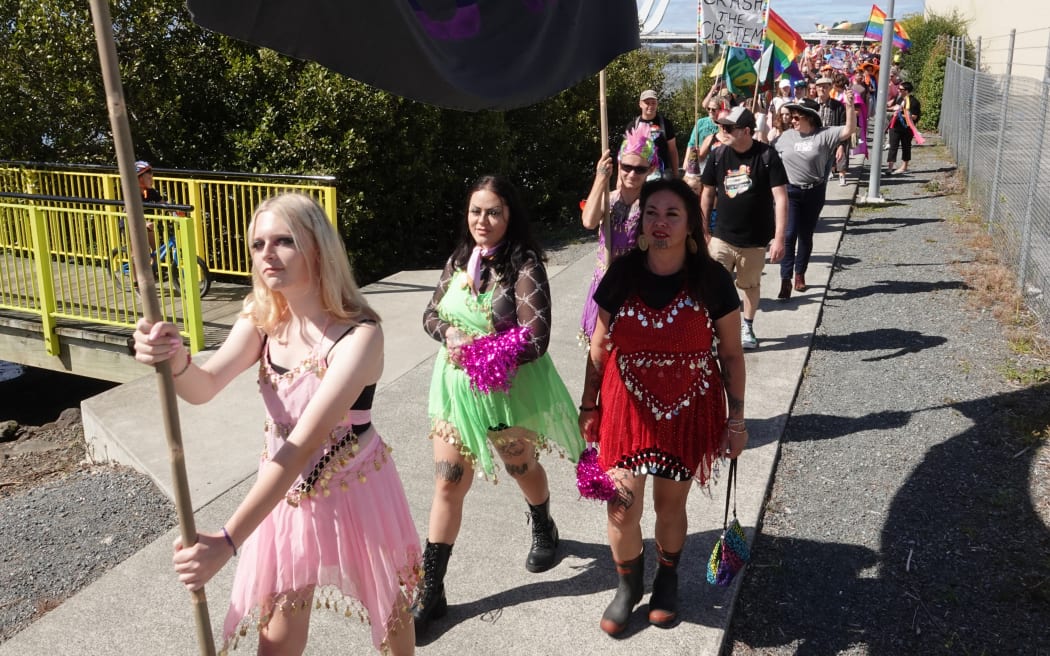 Phoenix Wood, of Hikurangi, leads her whānau in the parade.