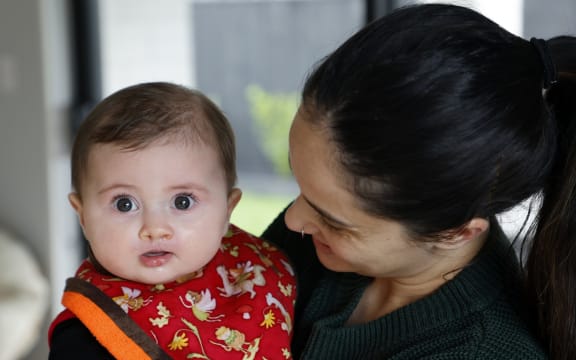 Serina Esposito, with daughter Layla-Rose, is concerned about the unfenced ponds. SUPPLIED: ANTHONY PHELPS/STUFF - SINGLE USE ONLY