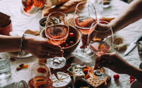 Glasses of rose wine seen during a friendly party of a celebration.
